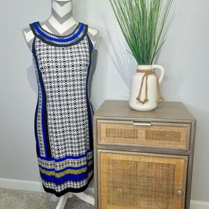 NWT DressBarn Dress. Geometric designs with detailed collar. Size 6
